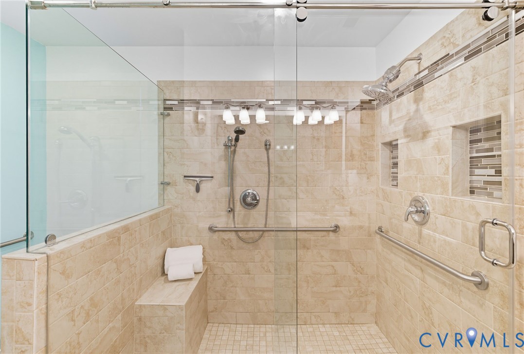 13712 Woodbridge Crossing Way Midlothian, VA 23112 - Photo 17 of 33 a bathroom with a shower and a sink