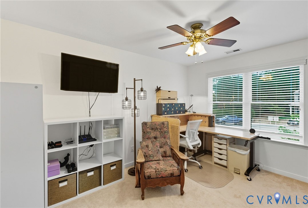 13712 Woodbridge Crossing Way Midlothian, VA 23112 - Photo 23 of 33 a view of a workspace with furniture and a window