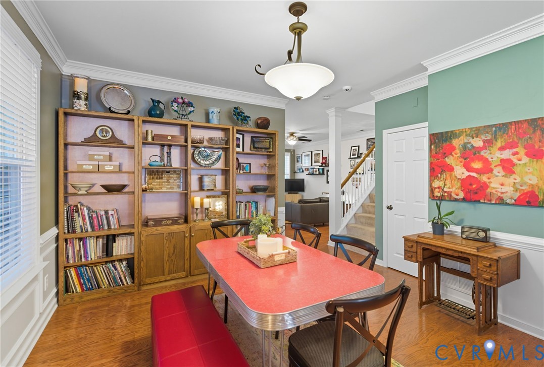 13712 Woodbridge Crossing Way Midlothian, VA 23112 - Photo 4 of 33 a outdoor dining room with furniture and wooden floor