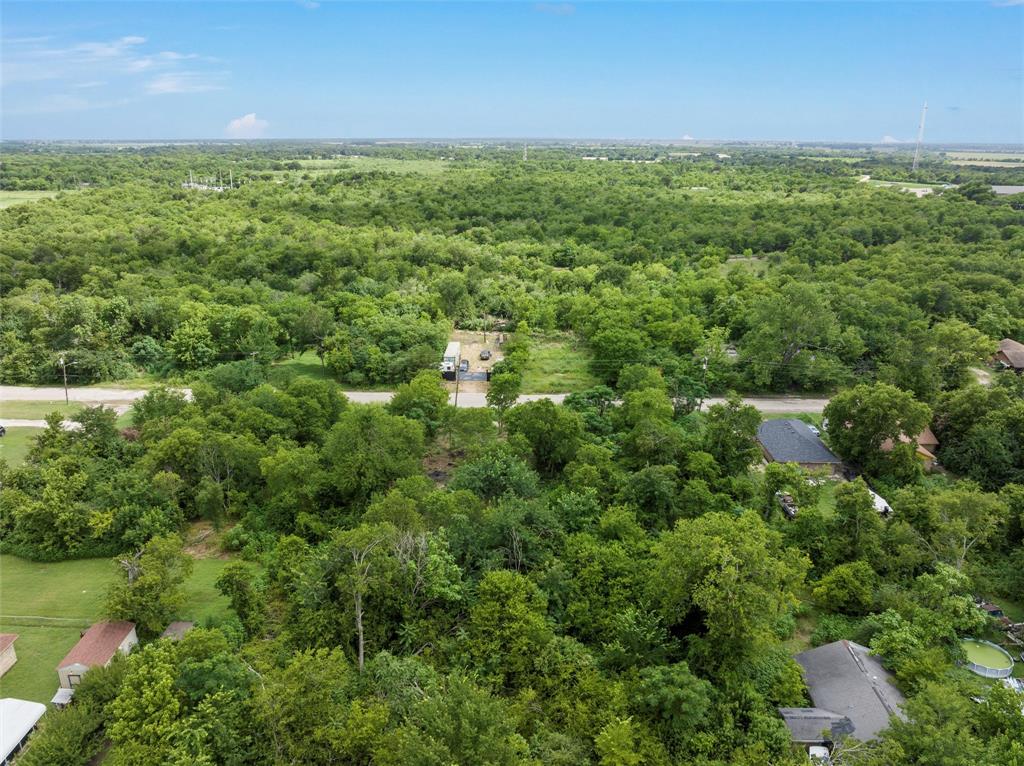 319 1st Street Marlin, TX 76661 - Photo 2 of 4 Aerial view of a heavily wooded area