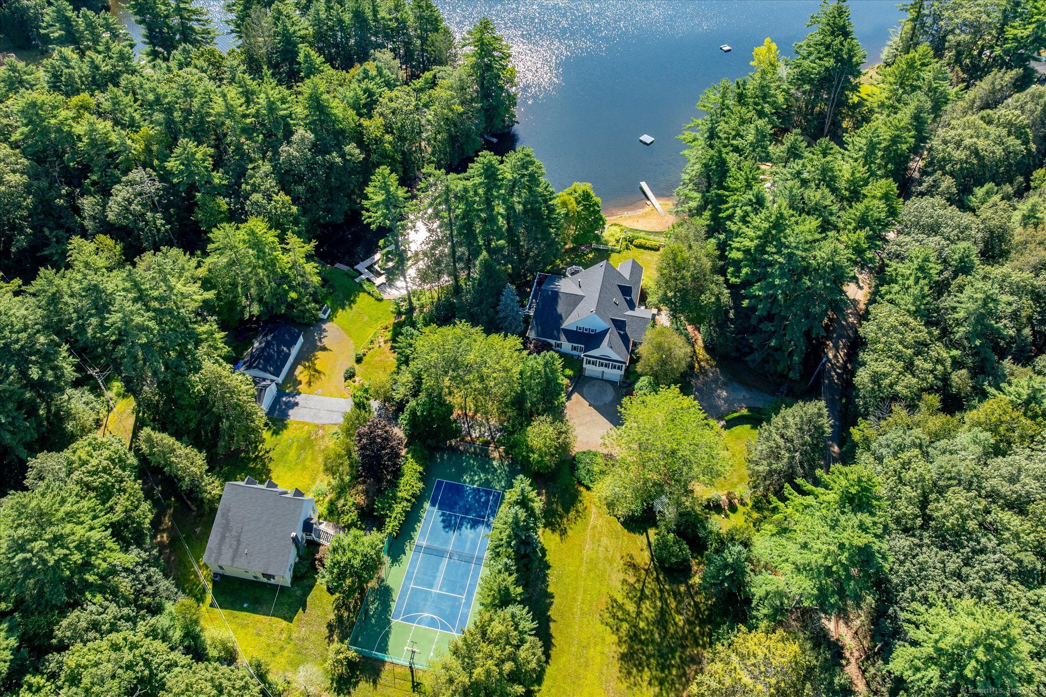 21-40 Howard Road Union, CT 06076 - Photo 1 of 40 an aerial view of a house with a yard and garden