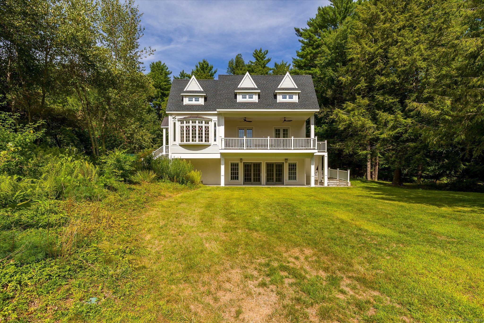 21-40 Howard Road Union, CT 06076 - Photo 21 of 40 a front view of a house with a garden