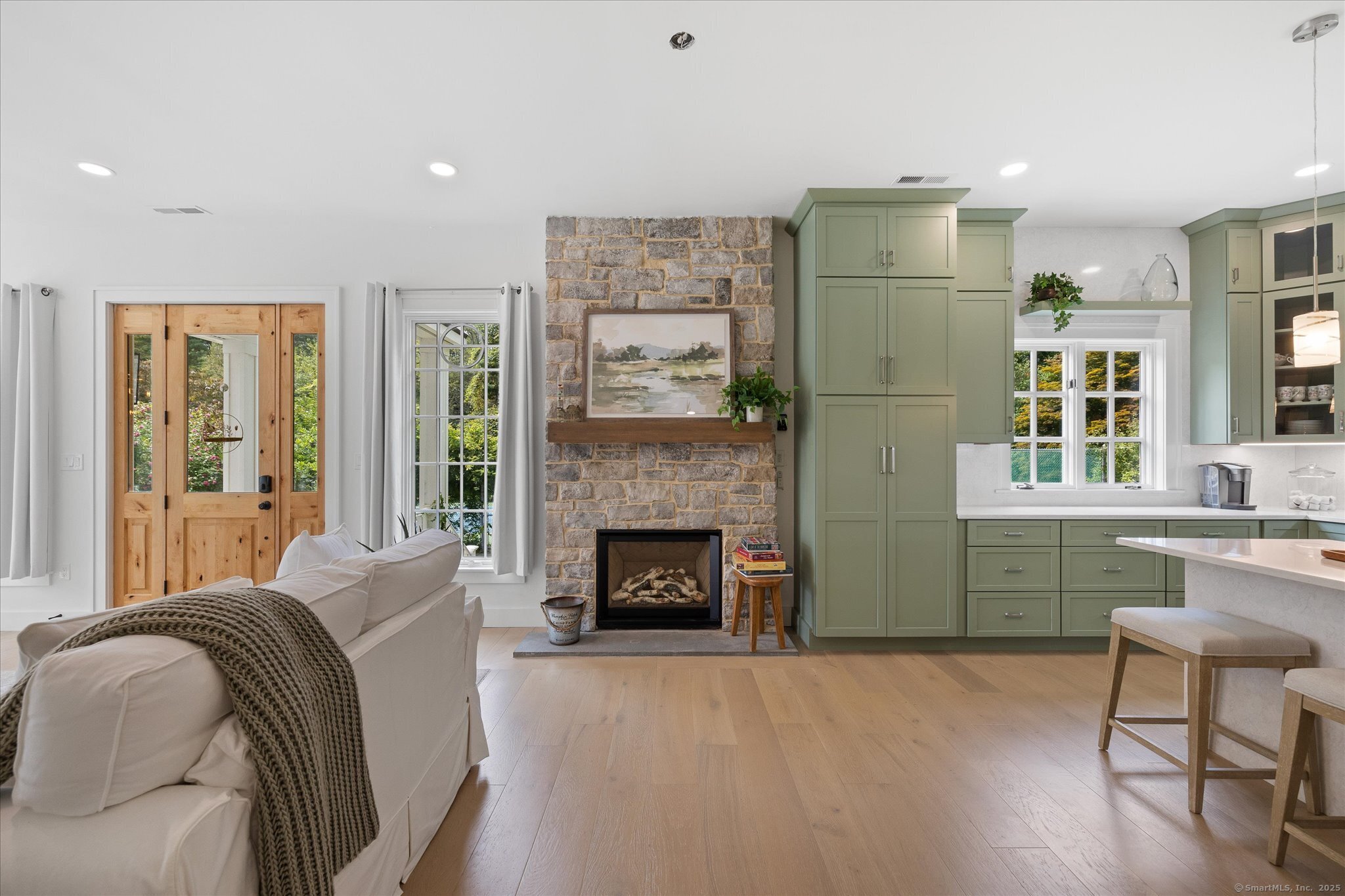 21-40 Howard Road Union, CT 06076 - Photo 22 of 40 a living room with furniture and a fireplace