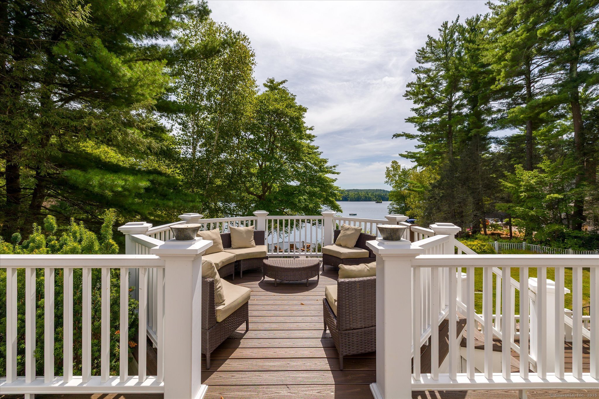 21-40 Howard Road Union, CT 06076 - Photo 37 of 40 a view of a deck with furniture and trees