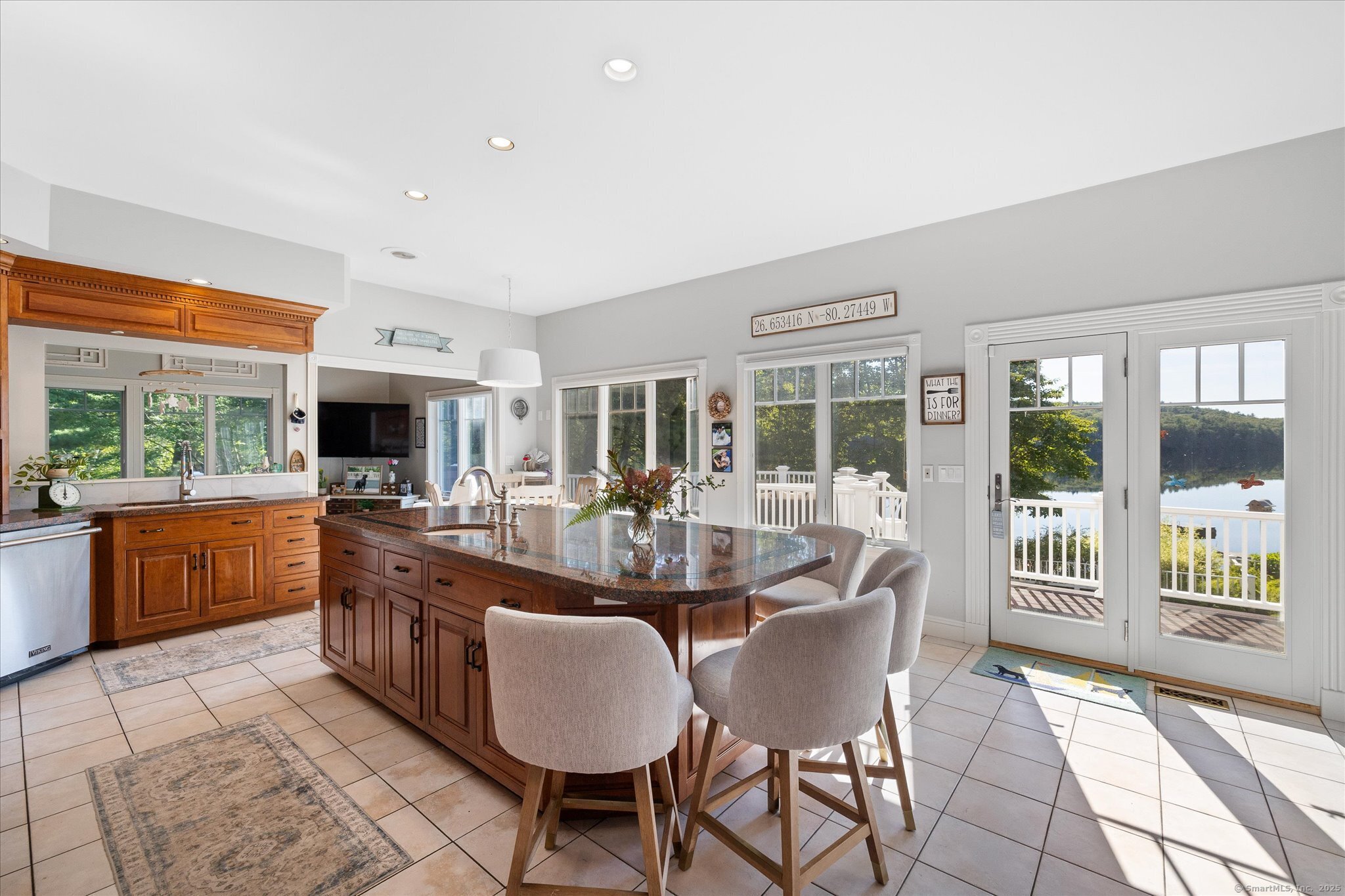 21-40 Howard Road Union, CT 06076 - Photo 6 of 40 a dining room with furniture a livingroom view and wooden floor