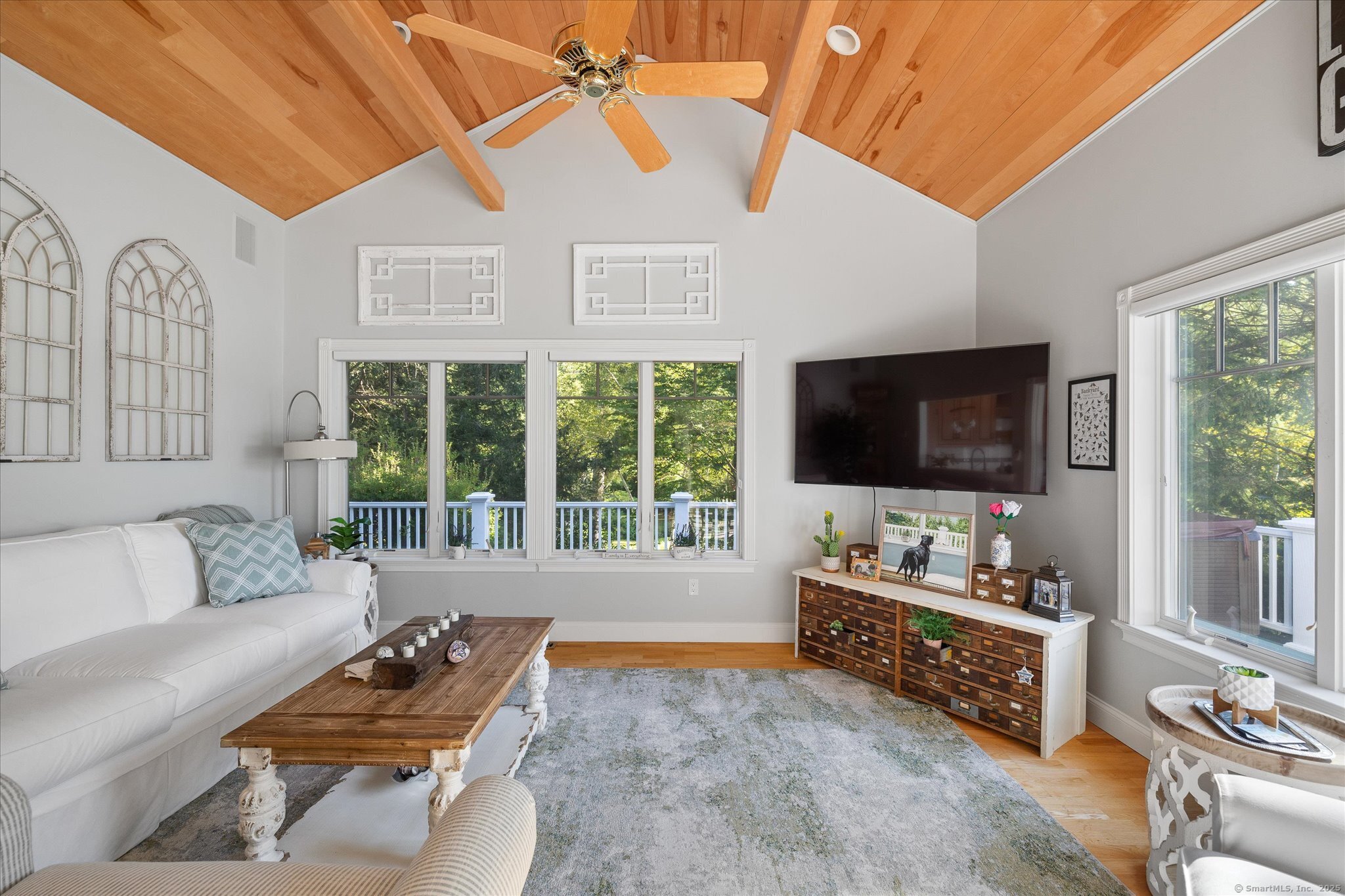 21-40 Howard Road Union, CT 06076 - Photo 8 of 40 a living room with furniture and a flat screen tv