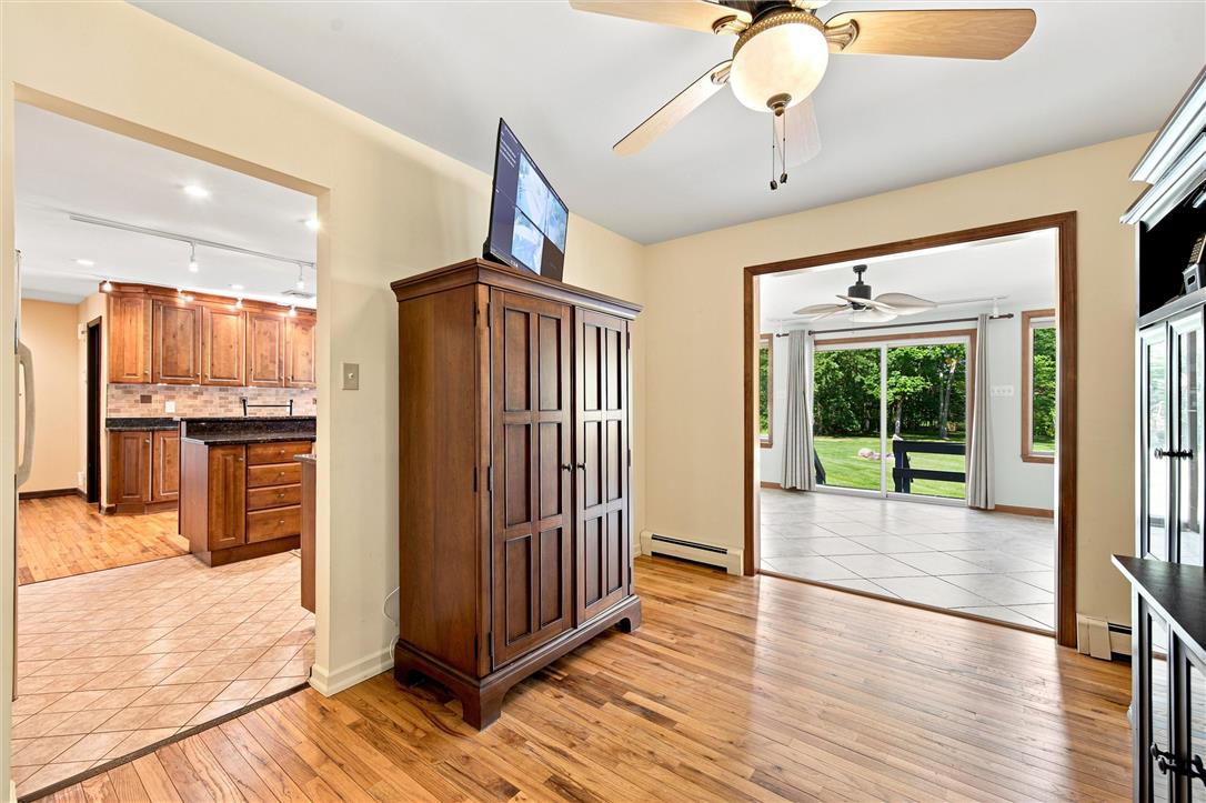 475 Crowthers Road Quakertown, PA 18951 - Photo 21 of 93 Hardwood floors lead to an inviting kitchen and a bright living area with expansive views of the backyard.