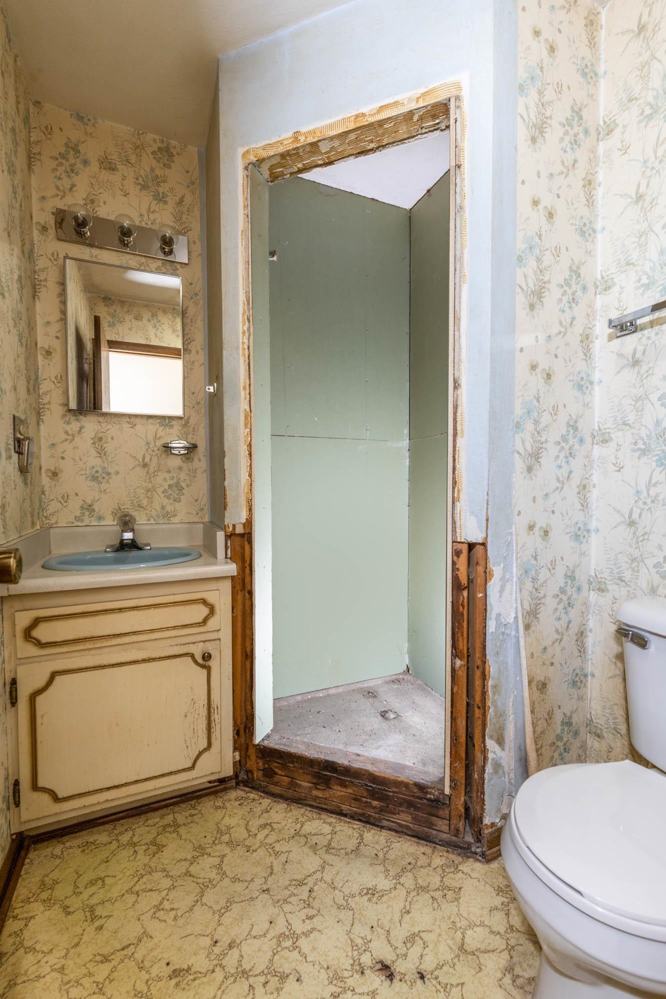 545 Baintree Road Lake Summerset, IL 61019 - Photo 15 of 28 a bathroom with a granite countertop sink mirror vanity and toilet