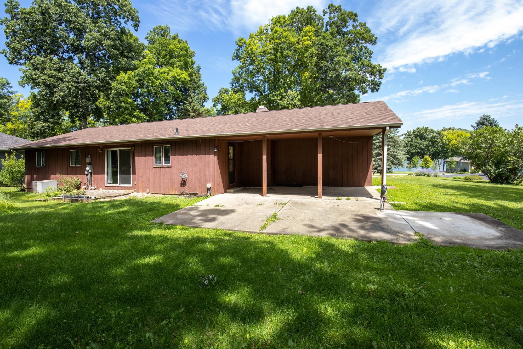 545 Baintree Road Lake Summerset, IL 61019 - Photo 28 of 28 a front view of a house with a yard and garage
