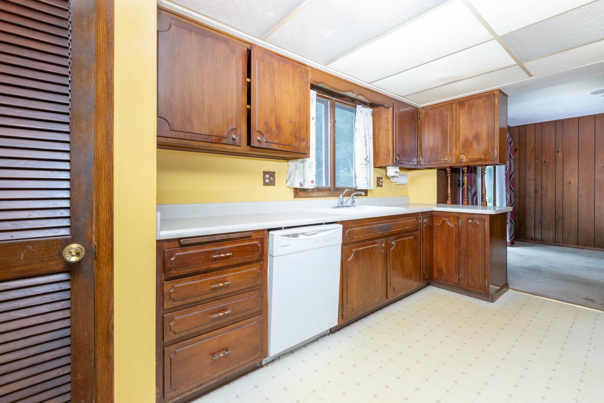 545 Baintree Road Lake Summerset, IL 61019 - Photo 9 of 28 a kitchen with stainless steel appliances granite countertop a refrigerator and cabinets