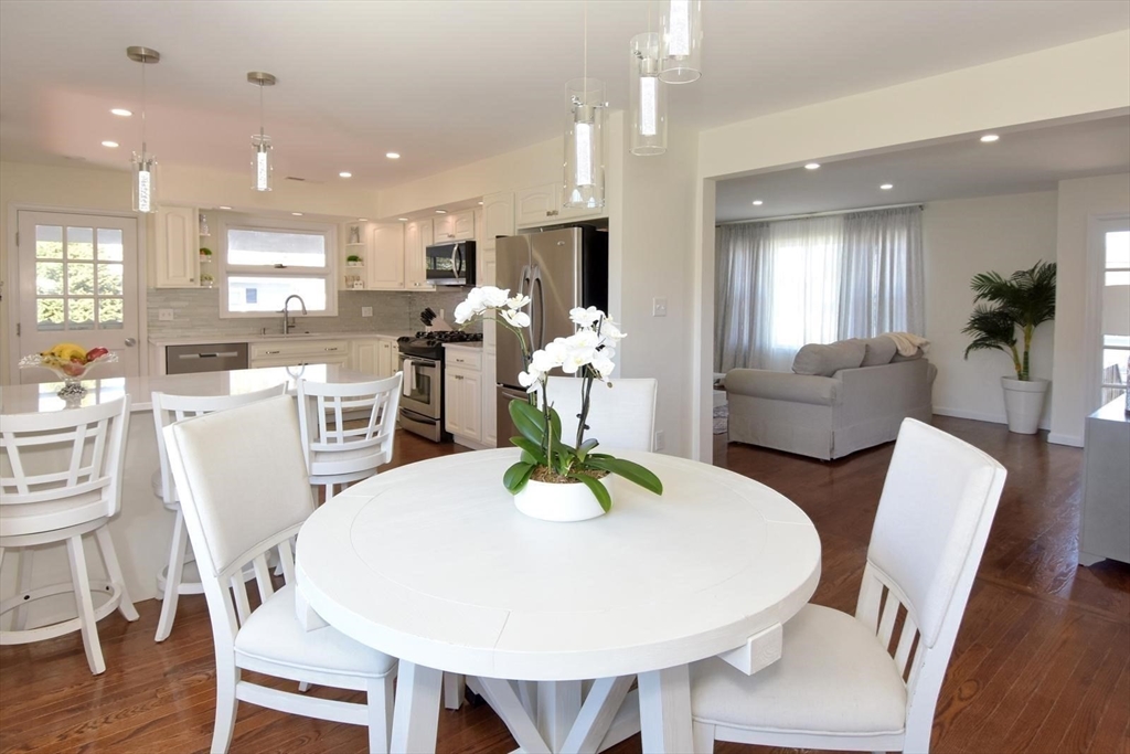 7 Erhardt Terrace Methuen, MA 01844 - Photo 15 of 24 a view of a dining room with furniture