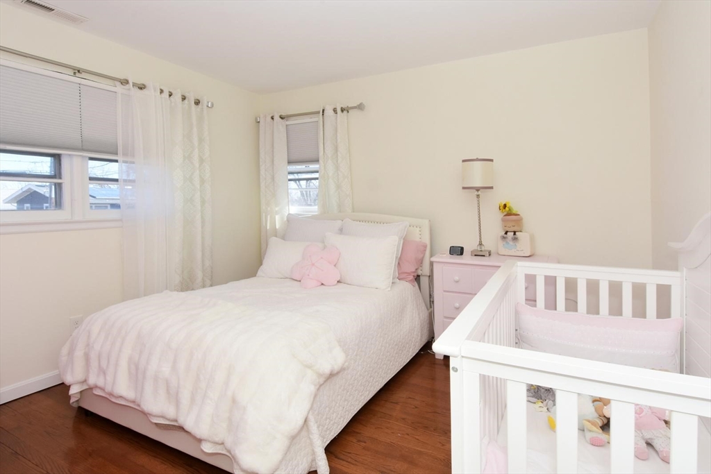 7 Erhardt Terrace Methuen, MA 01844 - Photo 23 of 24 a bedroom with a bed and a window