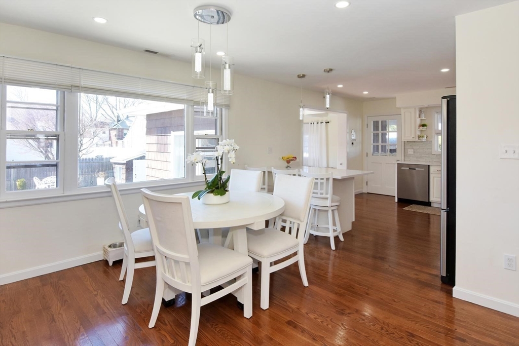 7 Erhardt Terrace Methuen, MA 01844 - Photo 7 of 24 a view of a dining room with furniture and wooden floor
