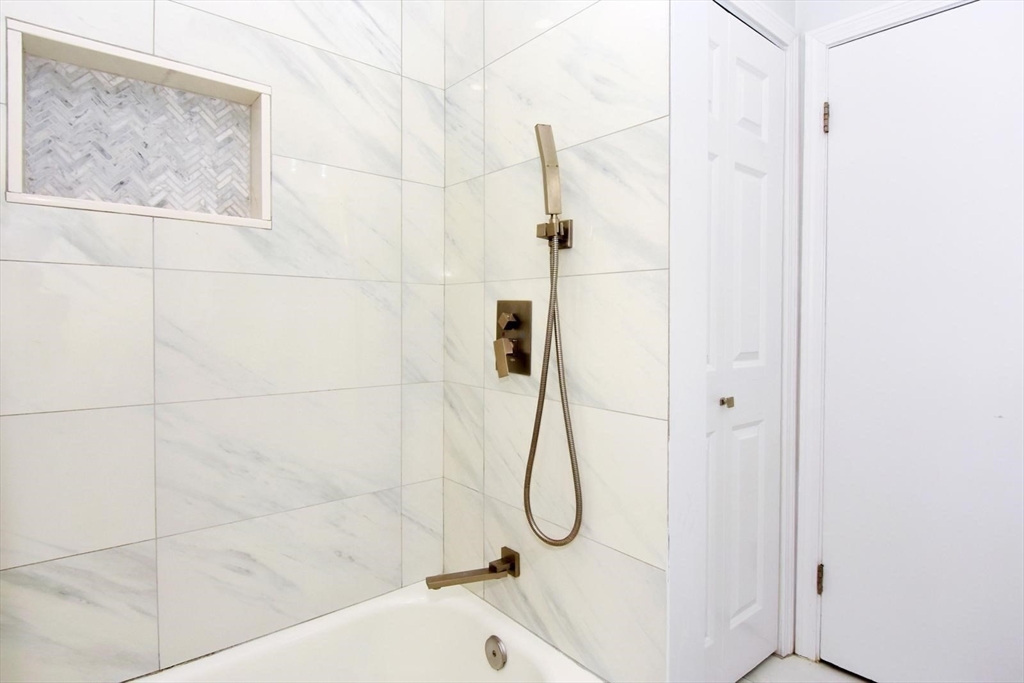 7 Erhardt Terrace Methuen, MA 01844 - Photo 10 of 24 a bathroom with a shower