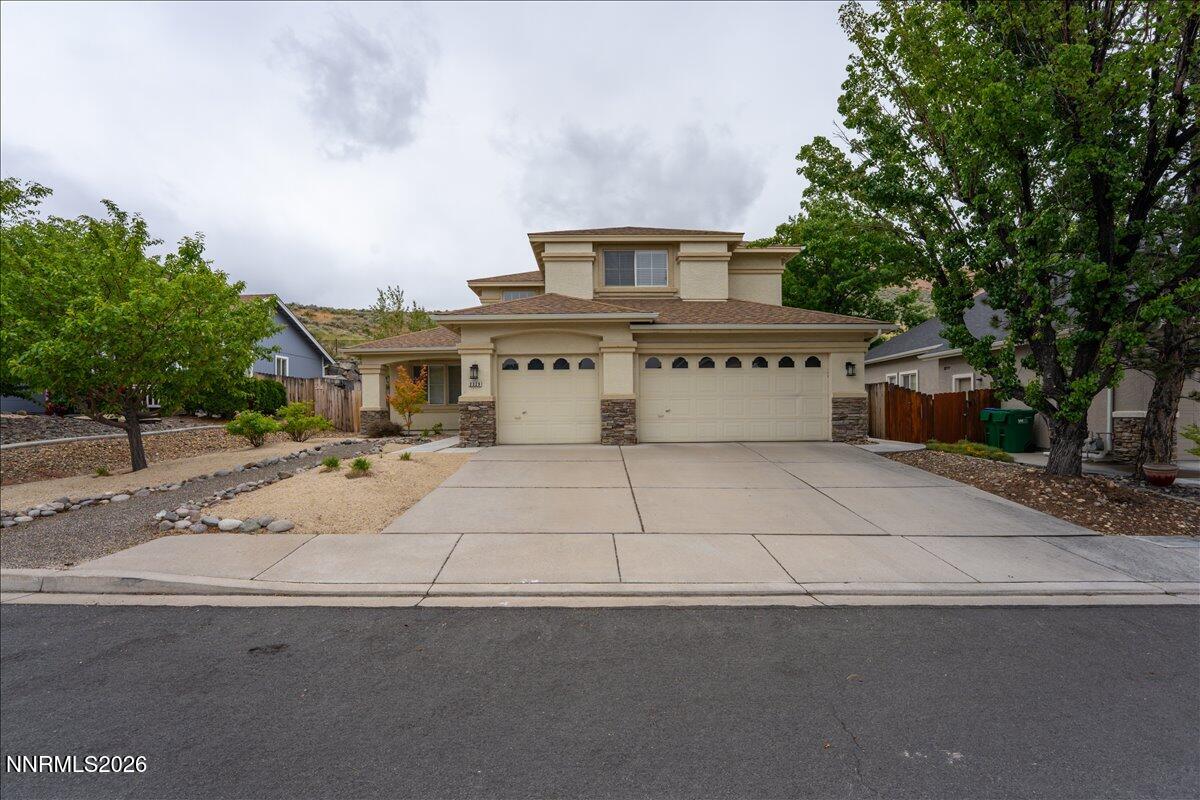 2329 Red Maple Court Reno, NV 89523 - Photo 2 of 39 front view of a house with a yard