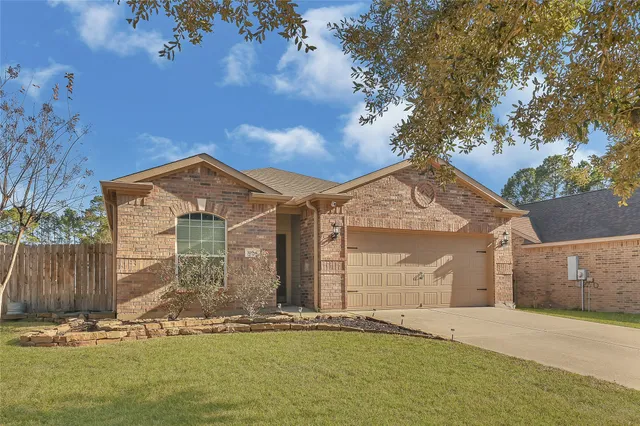 front view of a house with yard