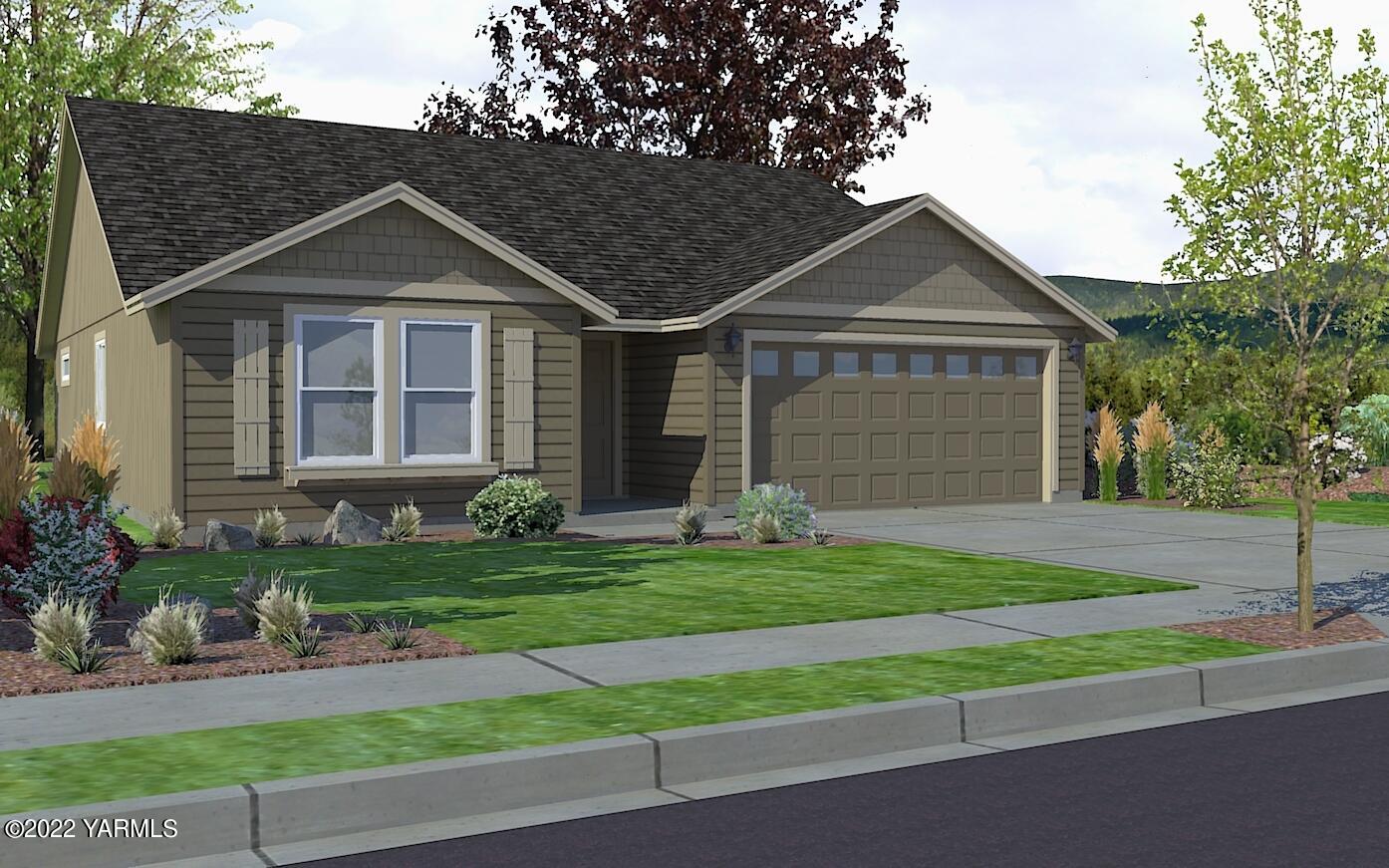 103 Bitters Loop Grandview, WA 98930 - Photo 1 of 1 a front view of a house with a yard and garage