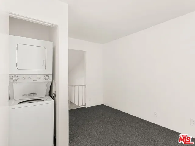 a bathroom with a shower and a toilet