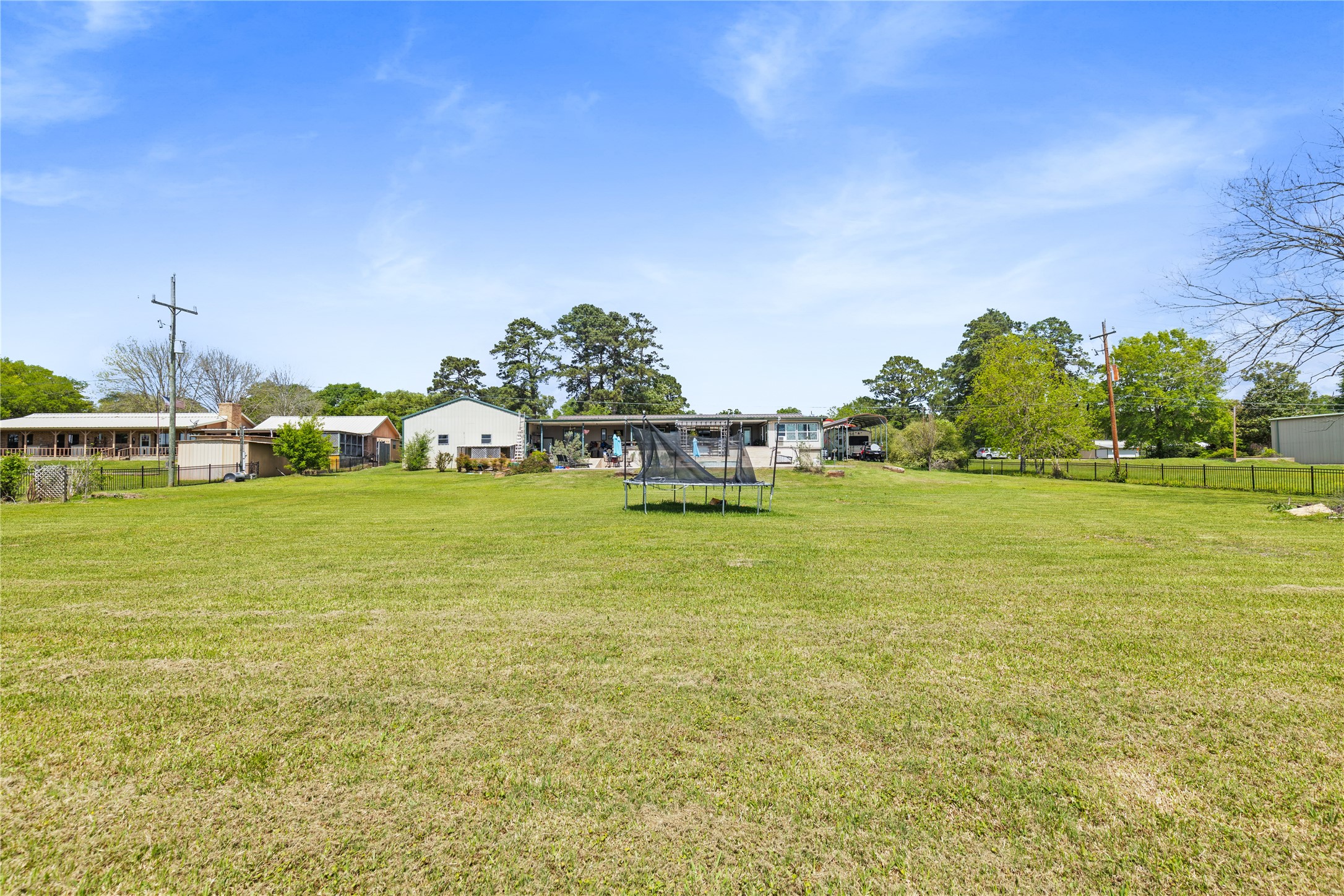 174 Lake Front Drive Trinity, TX 75862 - Photo 40 of 44 a view of a lake with houses