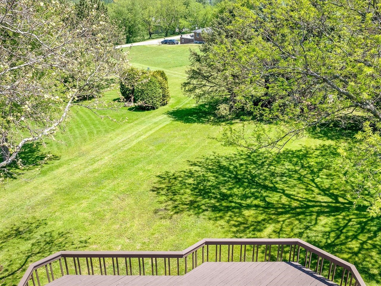 136 Lake Summerset Road Lake Summerset, IL 61019 - Photo 40 of 47 a view of a balcony with an outdoor space