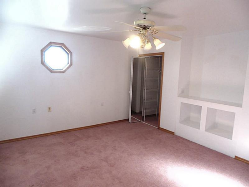 355 Monarch Road Dunbar, PA 15431 - Photo 16 of 25 Master Bedroom. walk-in closet built in shelves to the right