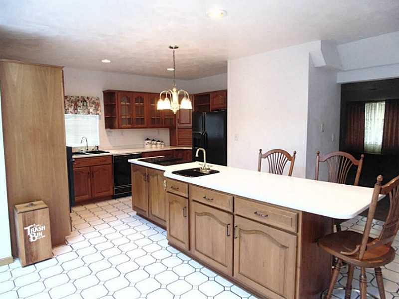 355 Monarch Road Dunbar, PA 15431 - Photo 4 of 25 Kitchen. All updated,ceramic tile floor,Island with faucet and stove top.bar stools included.