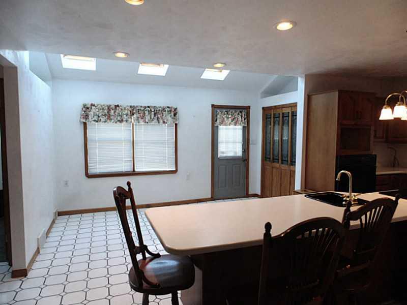 355 Monarch Road Dunbar, PA 15431 - Photo 7 of 25 Kitchen. extra area for table and chairs notice the 4 sky lights