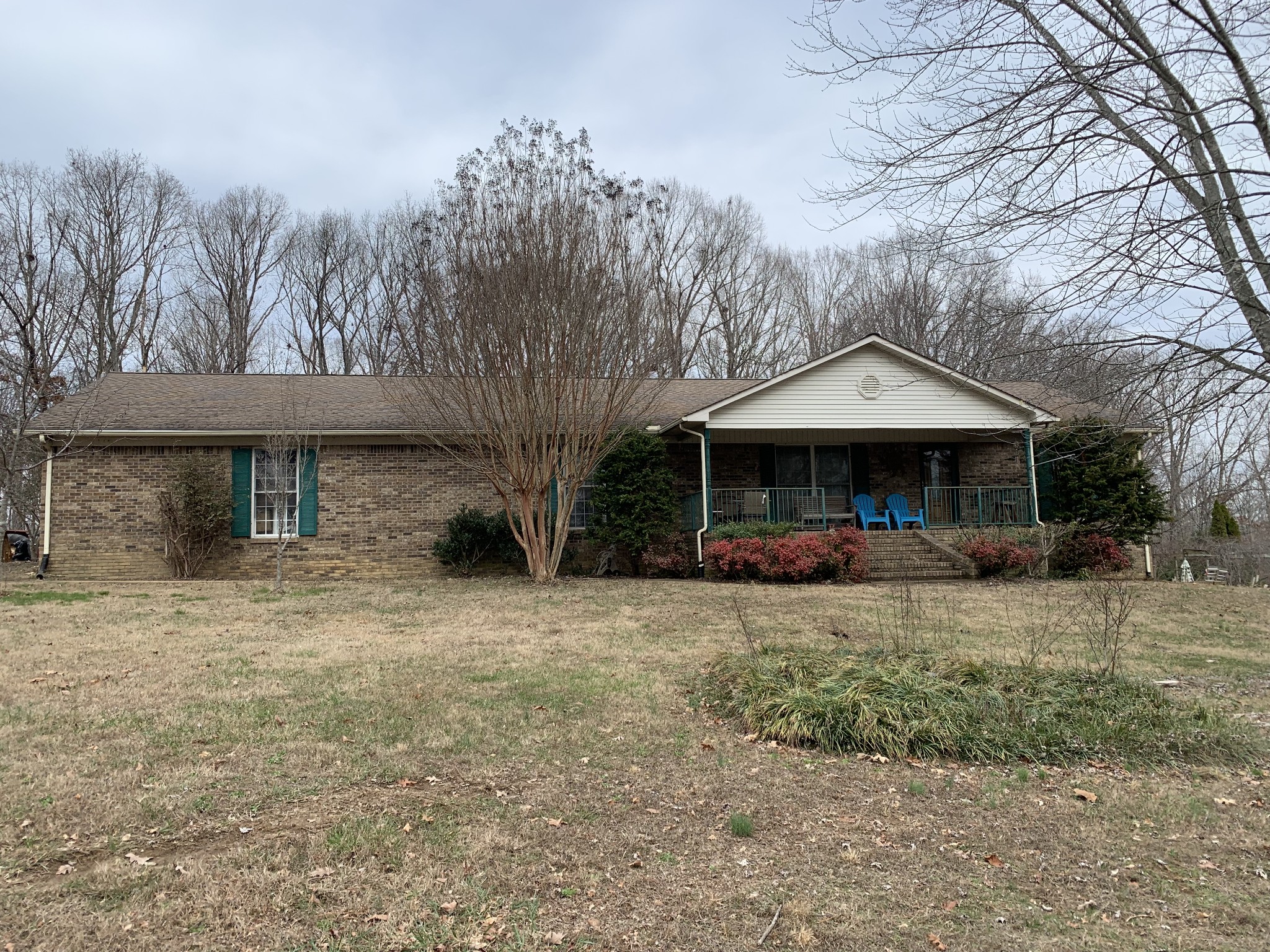 3190 Lanning Road Lawrenceburg, TN 38464 - Photo 1 of 30 a front view of a house with garden