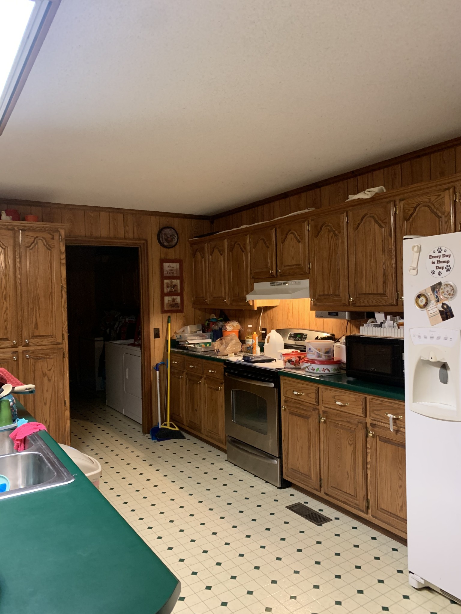 3190 Lanning Road Lawrenceburg, TN 38464 - Photo 3 of 30 a kitchen with granite countertop a sink cabinets and stainless steel appliances