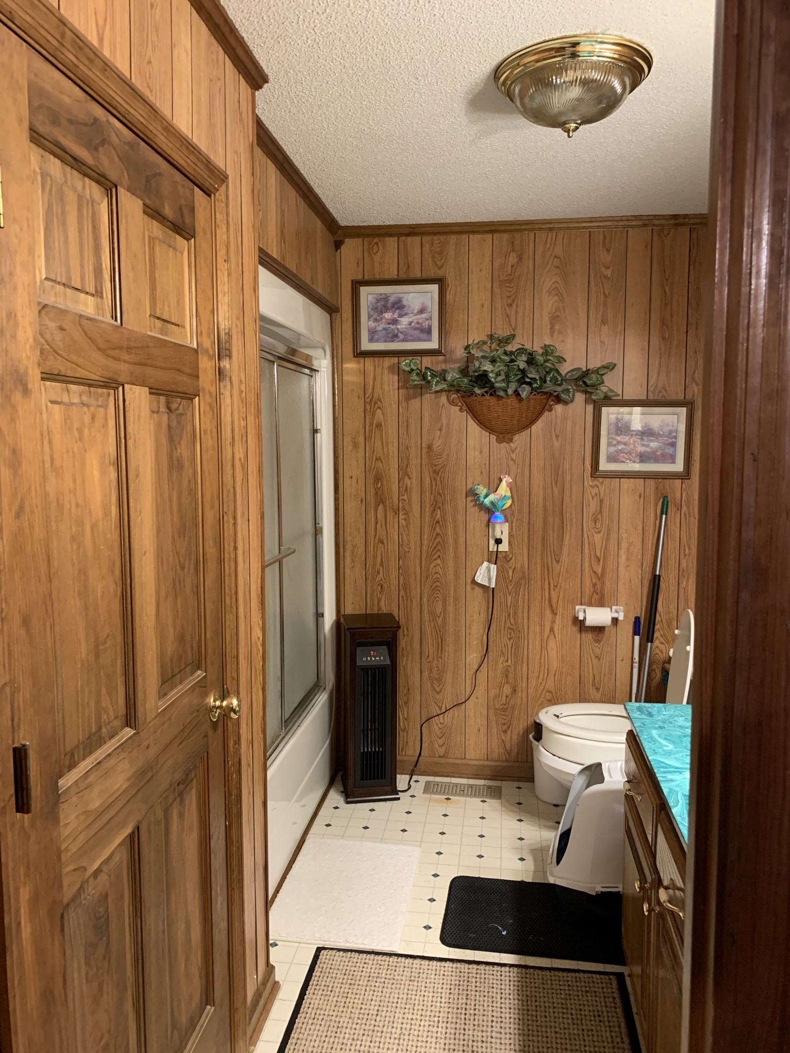 3190 Lanning Road Lawrenceburg, TN 38464 - Photo 7 of 30 a bathroom with a sink a toilet and shower