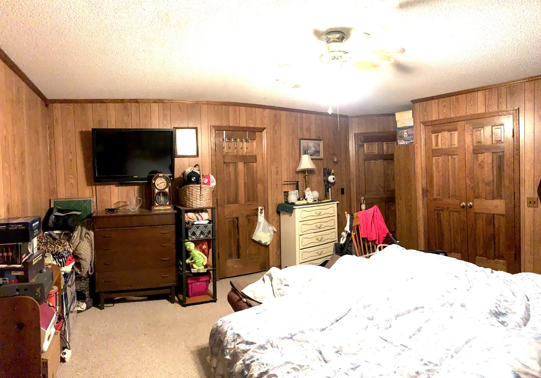 3190 Lanning Road Lawrenceburg, TN 38464 - Photo 8 of 30 a bed room with a bed and a flat screen tv