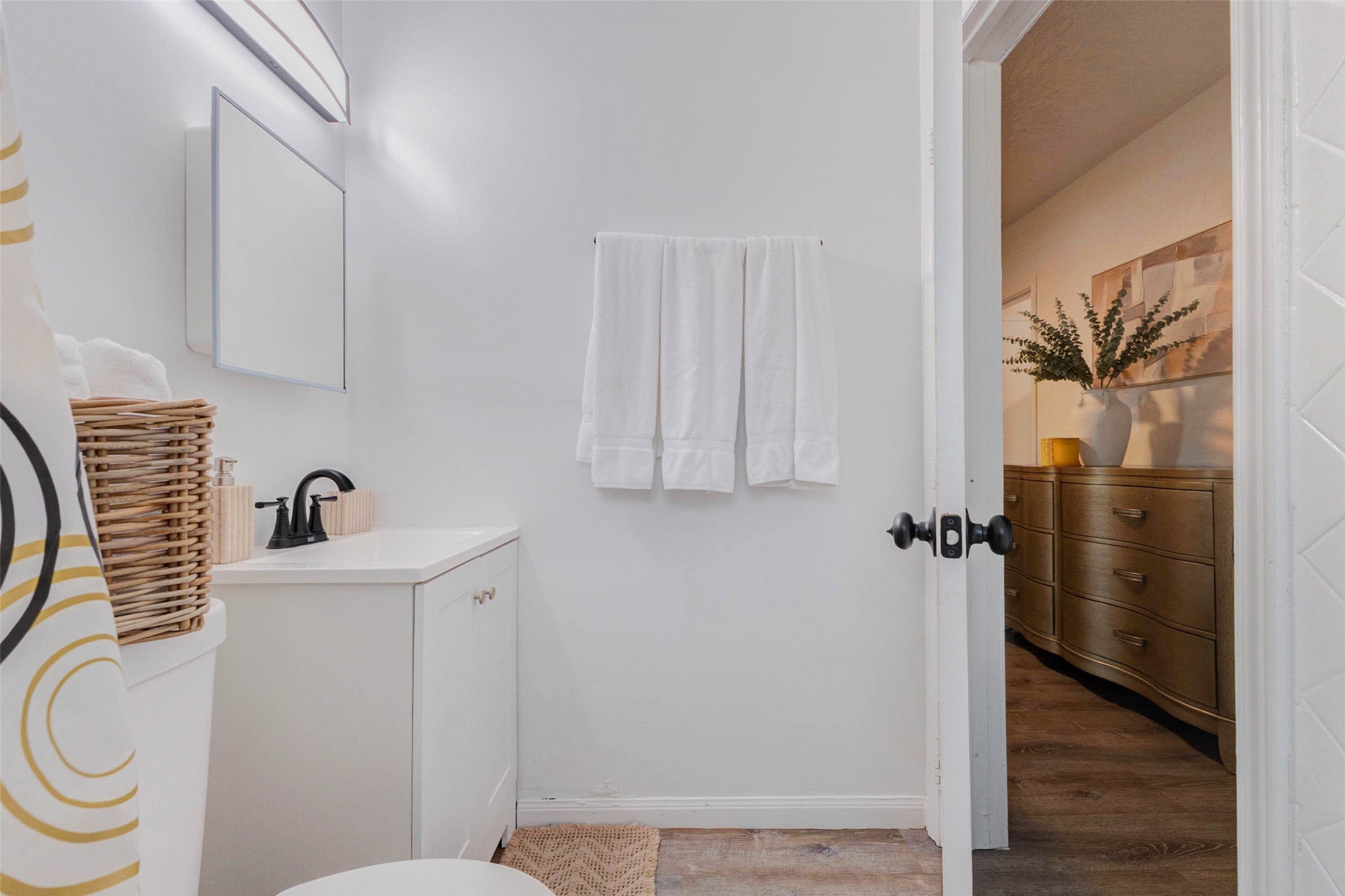 2902 Truxillo Street Houston, TX 77004 - Photo 22 of 32 a bathroom with a sink and a mirror