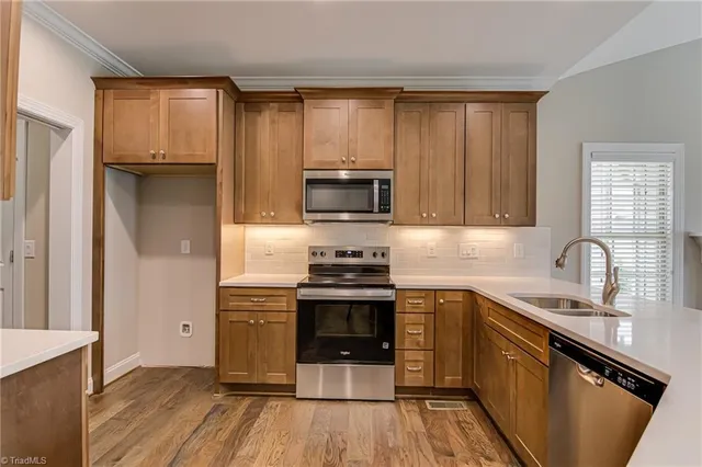 $496,900 | 1963 Whisper Lake Drive, Whitsett, NC 27377