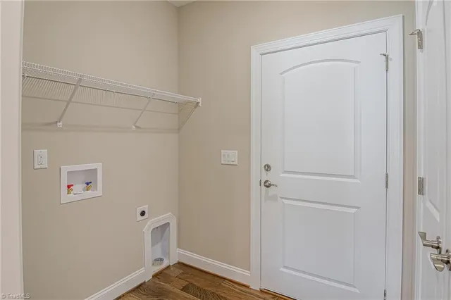 $496,900 | 1963 Whisper Lake Drive, Whitsett, NC 27377