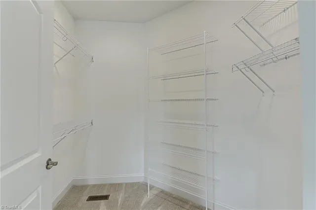 $496,900 | 1963 Whisper Lake Drive, Whitsett, NC 27377