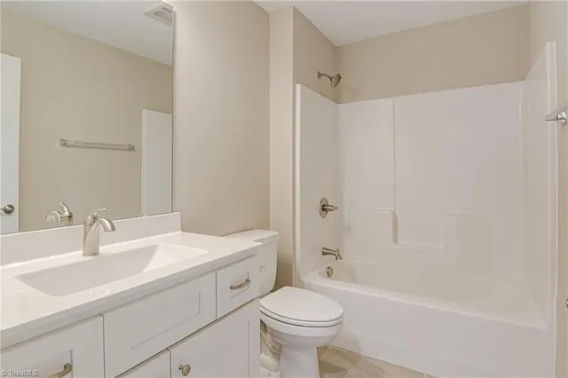 $496,900 | 1963 Whisper Lake Drive, Whitsett, NC 27377