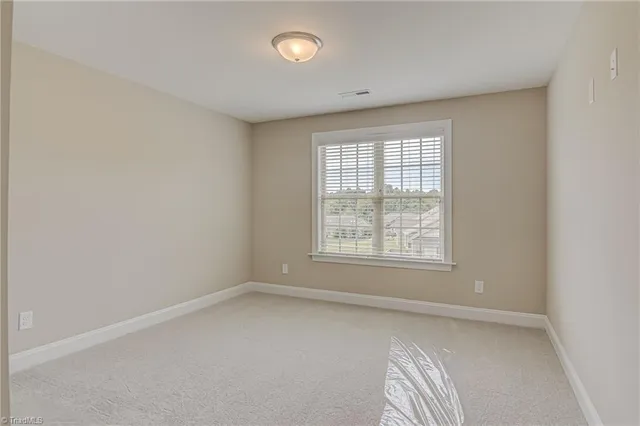 $496,900 | 1963 Whisper Lake Drive, Whitsett, NC 27377