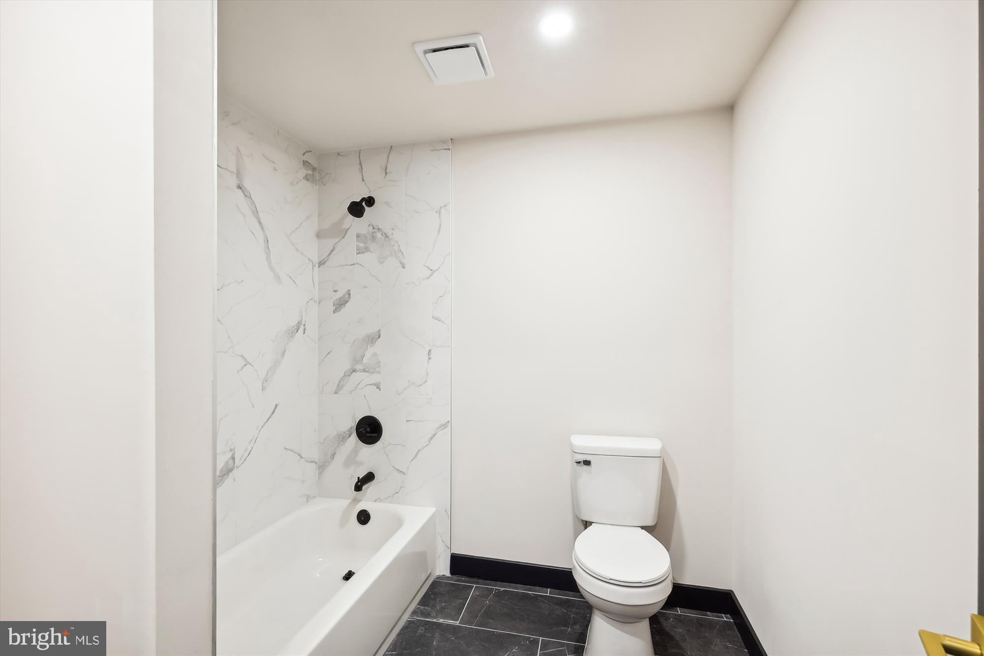 7643 Old Receiver Road Frederick, MD 21702 - Photo 58 of 82 a bathroom with a toilet and a shower