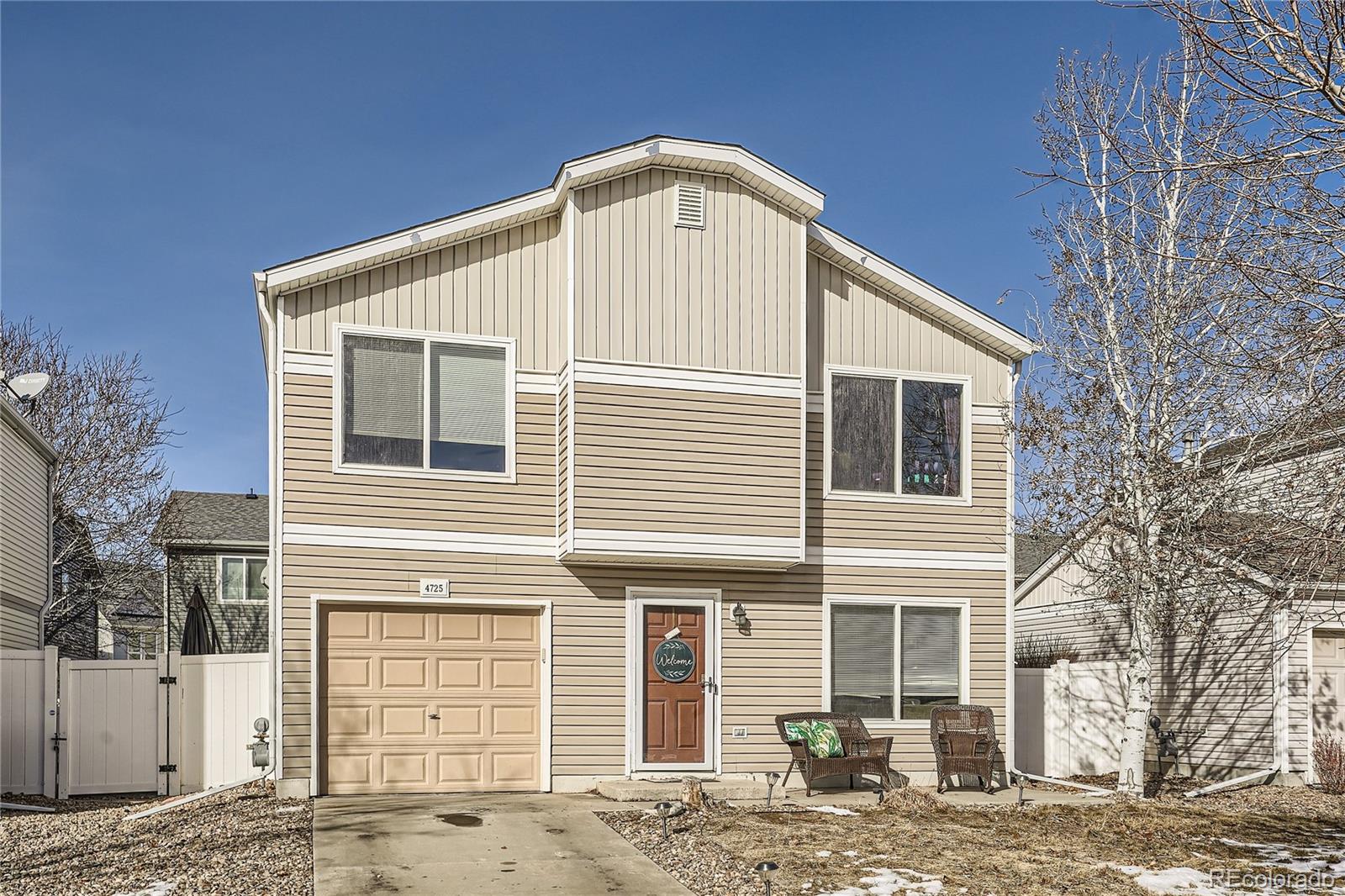 4725 Andes Street Denver, CO 80249 - Photo 1 of 27 a front view of a house