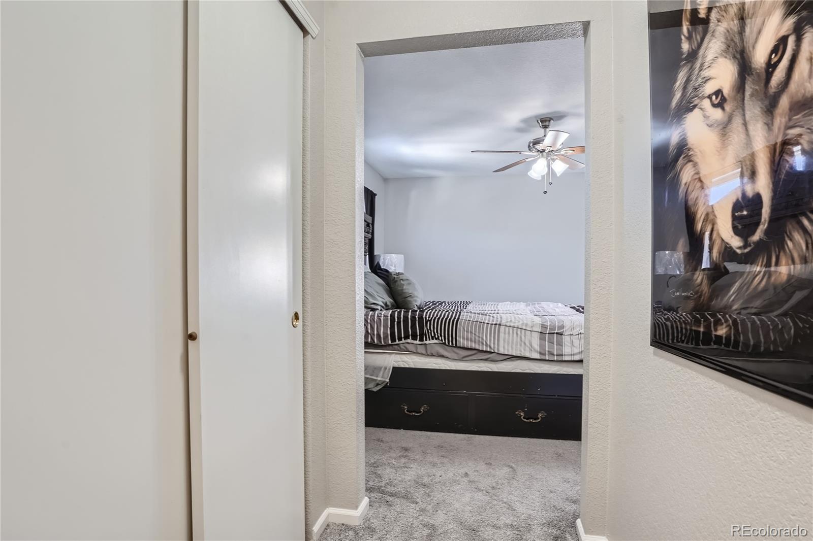 4725 Andes Street Denver, CO 80249 - Photo 14 of 27 a bathroom with a sink a toilet and a mirror