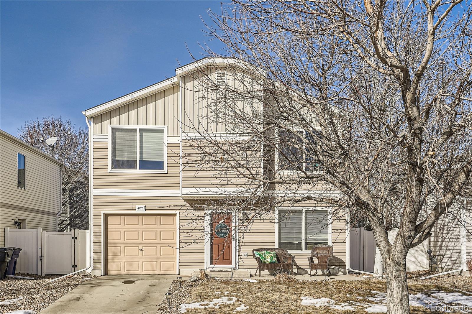 4725 Andes Street Denver, CO 80249 - Photo 2 of 27 a front view of a house
