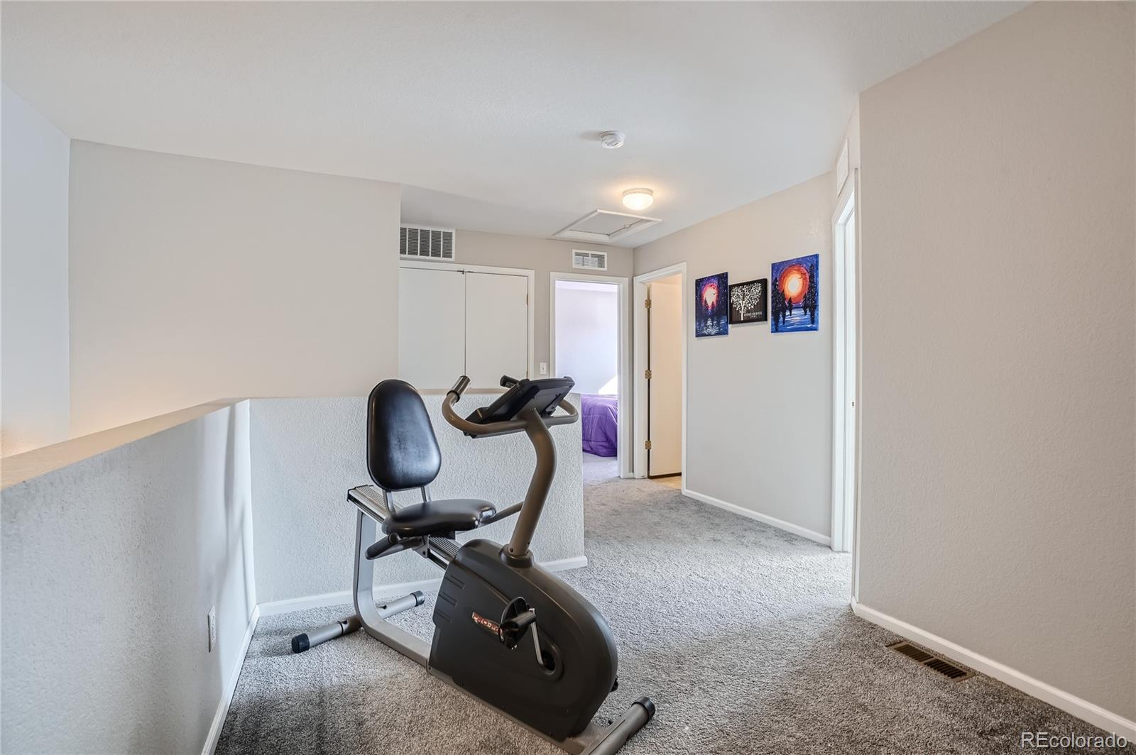 4725 Andes Street Denver, CO 80249 - Photo 21 of 27 a view of a room with gym equipment