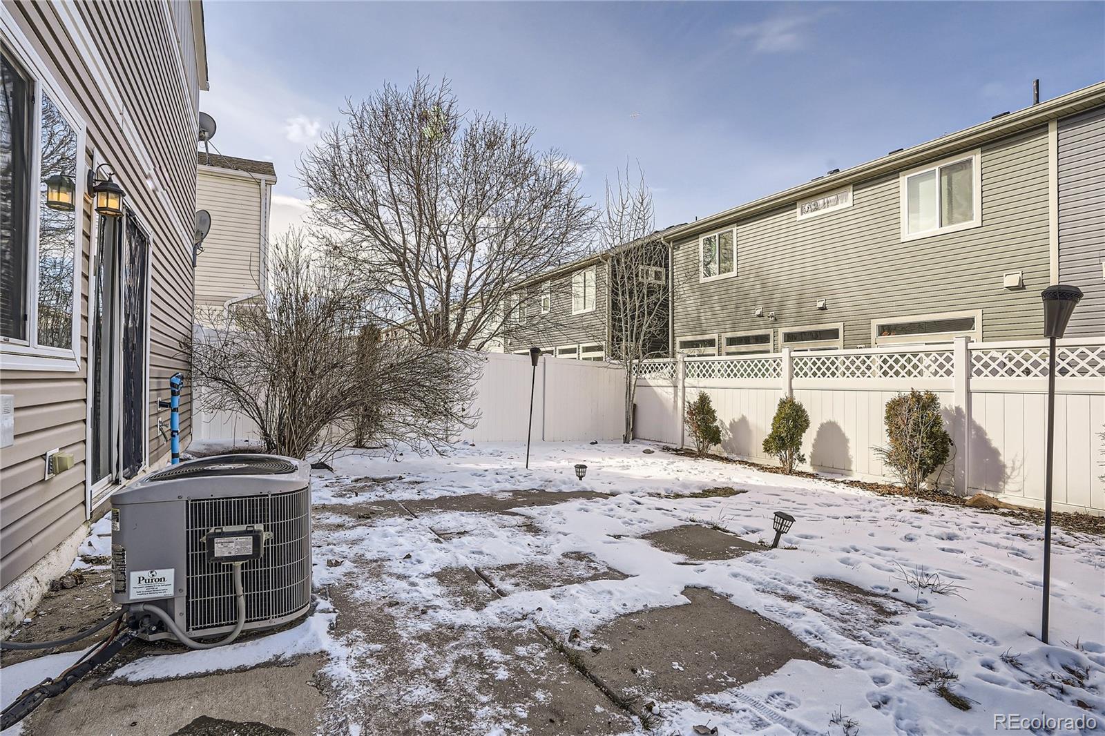 4725 Andes Street Denver, CO 80249 - Photo 25 of 27 a backyard of a house
