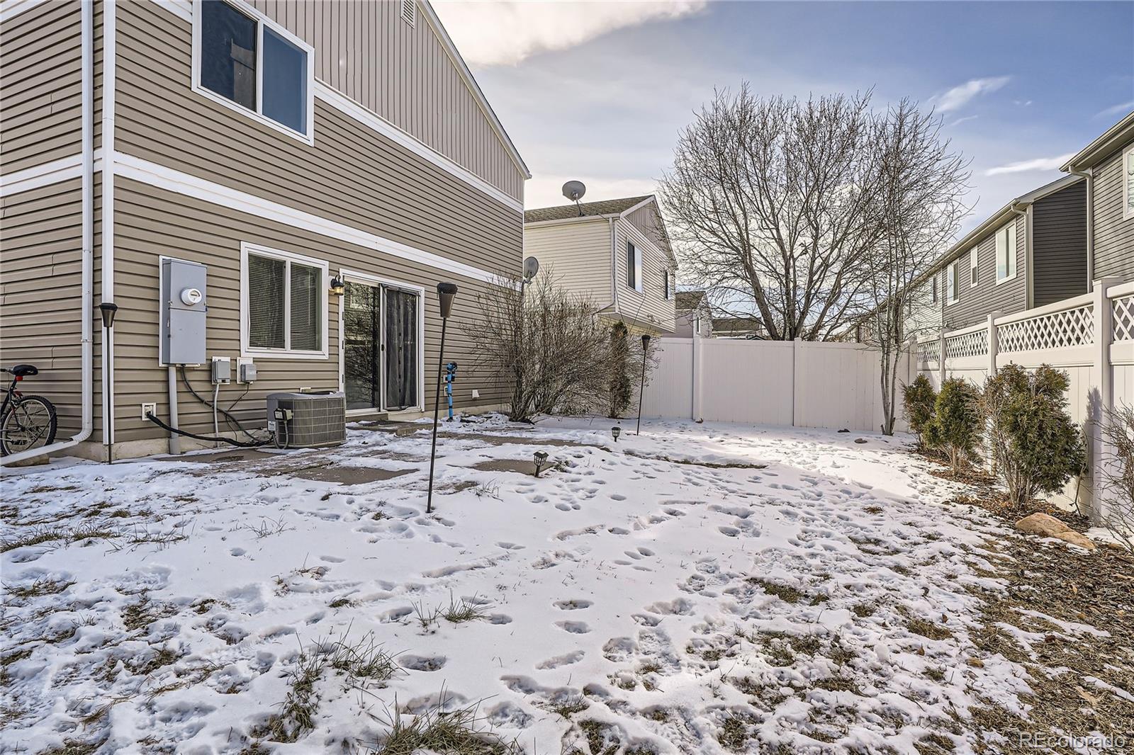 4725 Andes Street Denver, CO 80249 - Photo 26 of 27 a backyard of a house