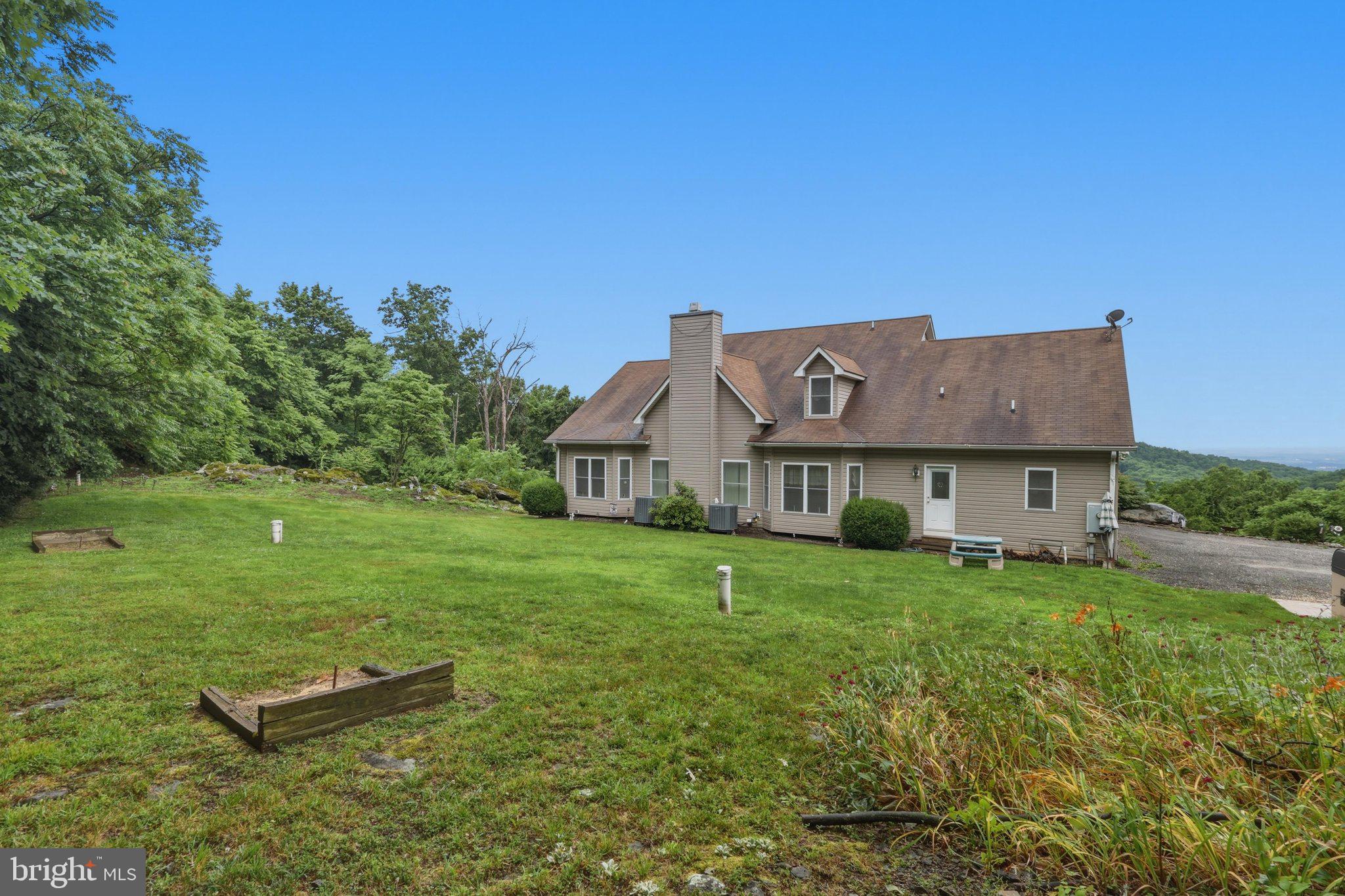 7020 Debold Road Thurmont, MD 21788 - Photo 63 of 75 Nice backyard for kids and horseshoe pits too