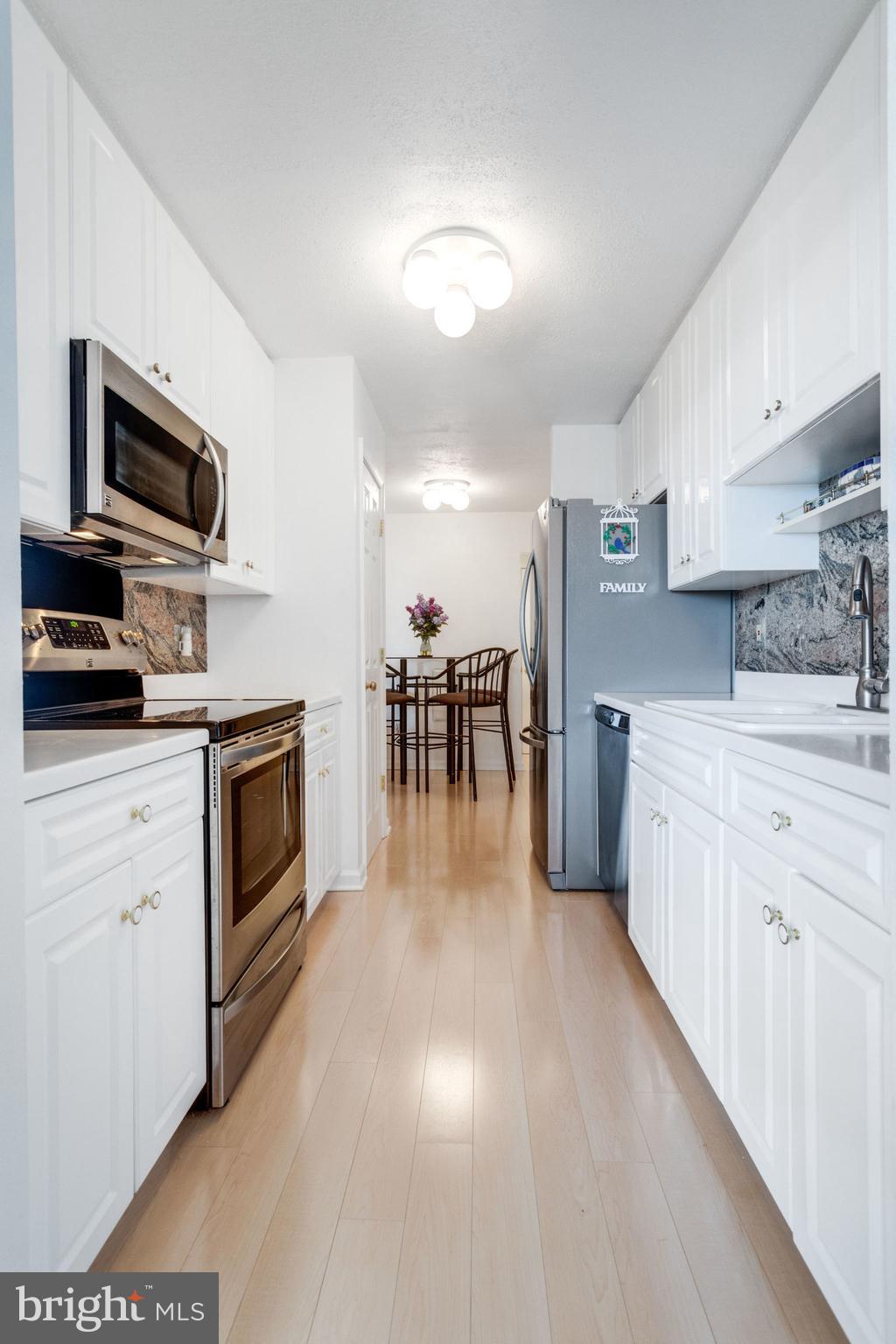 6101 Edsall Road, Unit 611 Alexandria, VA 22304 - Photo 17 of 65 GALLEY KITCHEN WITH BREAKFAST NOOK
