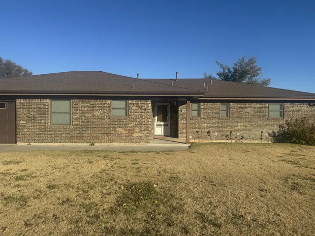 a view of a yard with an outdoor space