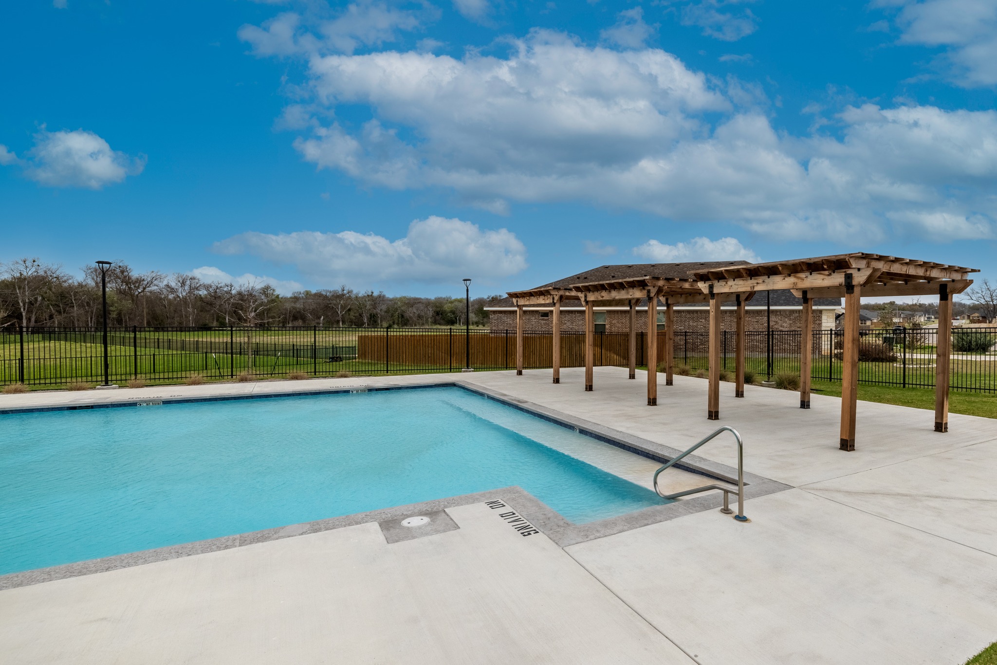6019 Monza Drive Temple, TX 76502 - Photo 34 of 40 Community pool with a pergola and a patio