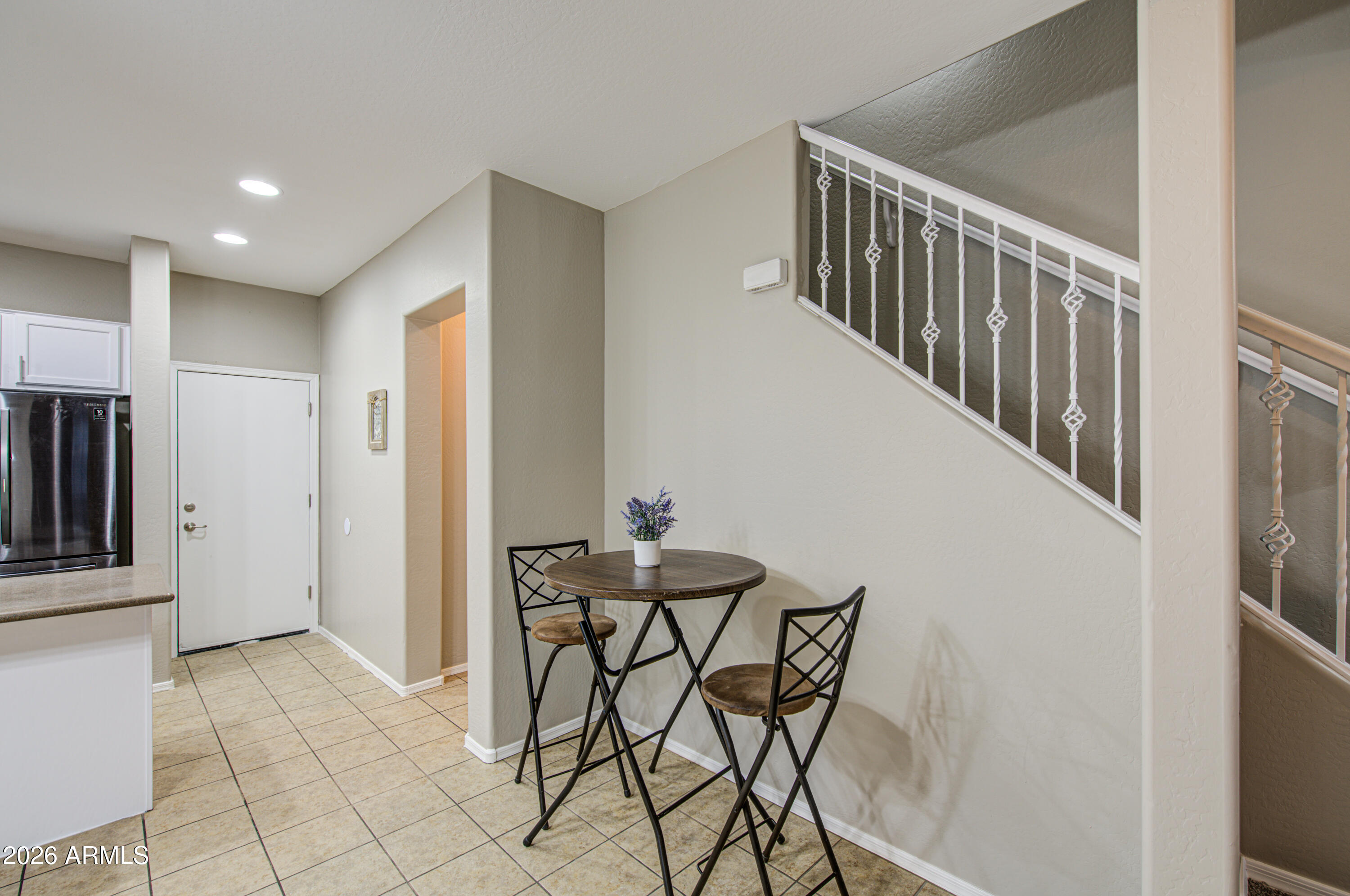 7759 West Monte Vista Road Phoenix, AZ 85035 - Photo 11 of 43 a view of a hallway with seating area