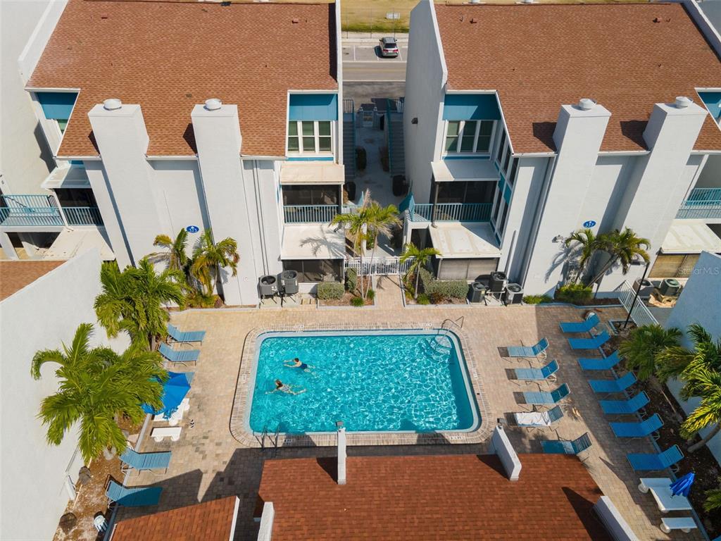 337 Rex Place, Unit G Madeira Beach, FL 33708 - Photo 31 of 40 a view of balcony with furniture